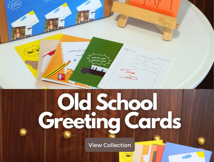 old school design greeting cards, vintage arabic greeting cards on a table 