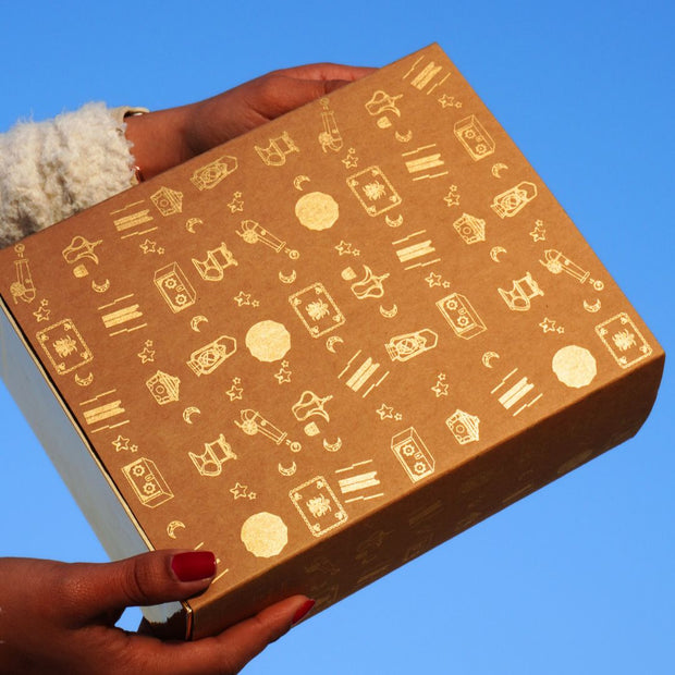 women holds golden icon Ramadan gift box