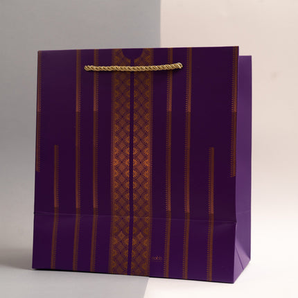 purple color gift bag with thobe nashal design